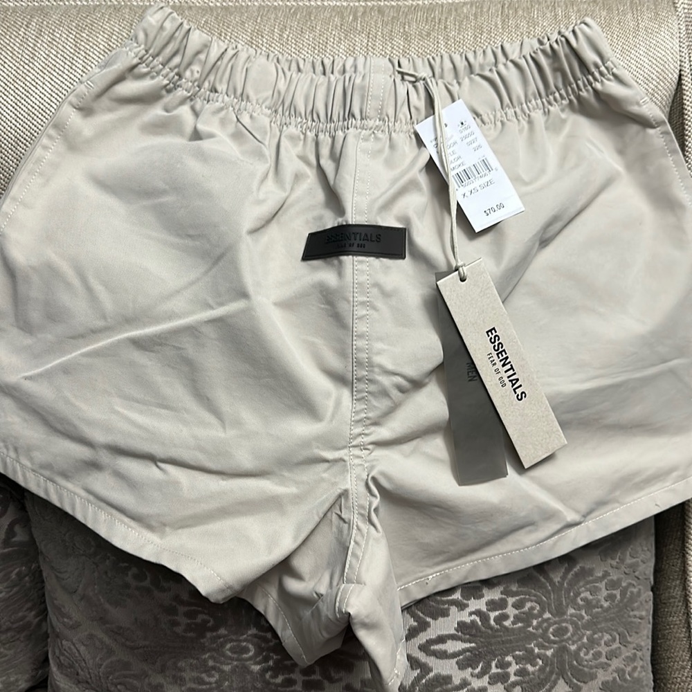 Fear of God Essentials running shorts. Smoke (beige). New w/tags. Mens XXS